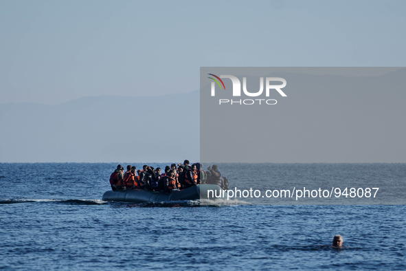 Migrants approach the coast of the northeastern Greek island of Lesbos on Thursday, Dec. 7, 2015. About 5,000 migrants are reaching Europe e...