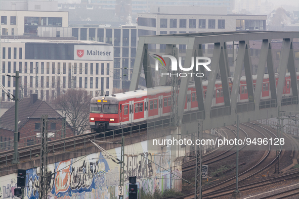 

A German regional train (Deutsche Bahn) is approaching the Deutz station in Cologne, Germany on January 25, 2023, as the state government...