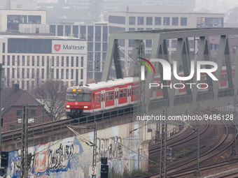 

A German regional train (Deutsche Bahn) is approaching the Deutz station in Cologne, Germany on January 25, 2023, as the state government...