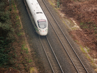 

A German ICE high-speed train (Deutsche Bahn) is approaching the Deutz station in Cologne, Germany on January 25, 2023, as the state gover...