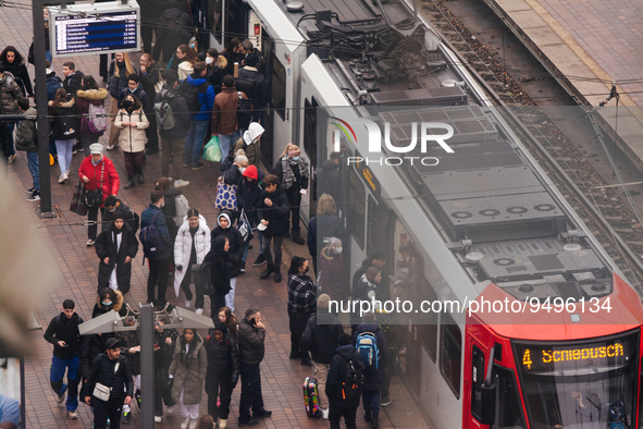 

A street train is arriving at the platform of Lanxess Arena as people get out of the train in Cologne, Germany on January 25, 2023, as the...