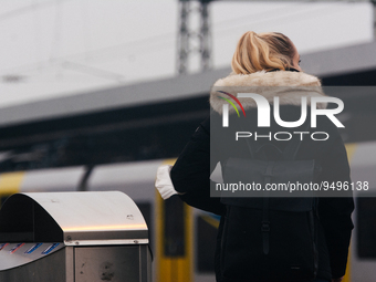 

A passenger is seen waiting at the train platform of the Deutz station in Cologne, Germany on January 25, 2023, as the state government of...