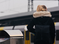 

A passenger is seen waiting at the train platform of the Deutz station in Cologne, Germany on January 25, 2023, as the state government of...