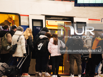 

Passengers are seen getting on the German regional train (Deutsch Bahn) at Cologne Central Station in Cologne, Germany on January 25, 2023...