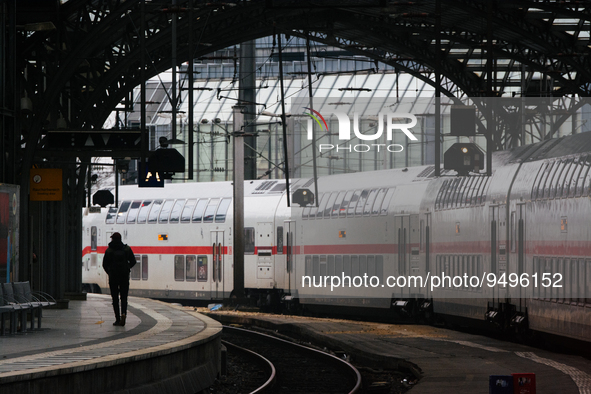 

A passenger is seen on the platform as an ICE high-speed train (Deutsche Bahn) parks at Cologne Central Station in Cologne, Germany on Jan...