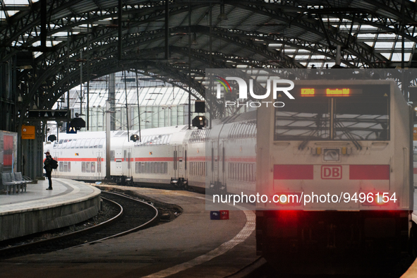 

A passenger is seen on the platform as an ICE high-speed train (Deutsche Bahn) parks at Cologne Central Station in Cologne, Germany on Jan...