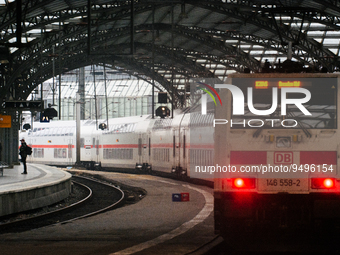 

A passenger is seen on the platform as an ICE high-speed train (Deutsche Bahn) parks at Cologne Central Station in Cologne, Germany on Jan...