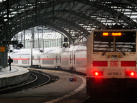 

A passenger is seen on the platform as an ICE high-speed train (Deutsche Bahn) parks at Cologne Central Station in Cologne, Germany on Jan...