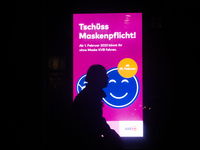 

A general view of a "Goodbye to Mask Mandate" sign is seen illuminated in front of a KVB Street Bahn local office in Cologne, Germany on J...