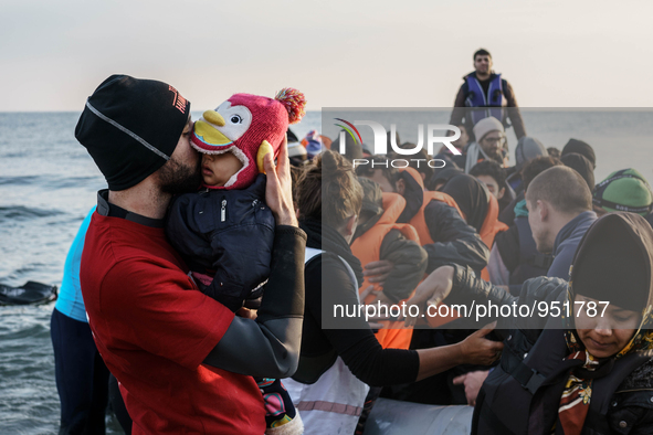 Migrants approach the coast of the Mytilene Greece island of Lesbos on Dec. 9, 2015. 