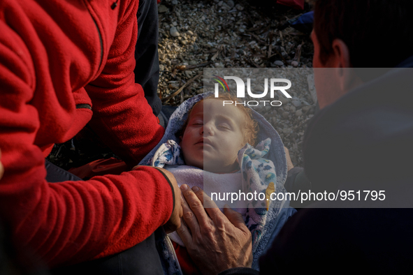 Migrants approach the coast of the Mytilene Greece island of Lesbos on Dec. 9, 2015. 