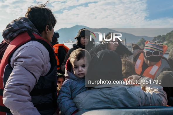 Migrants approach the coast of the Mytilene Greece island of Lesbos on Dec. 9, 2015. 