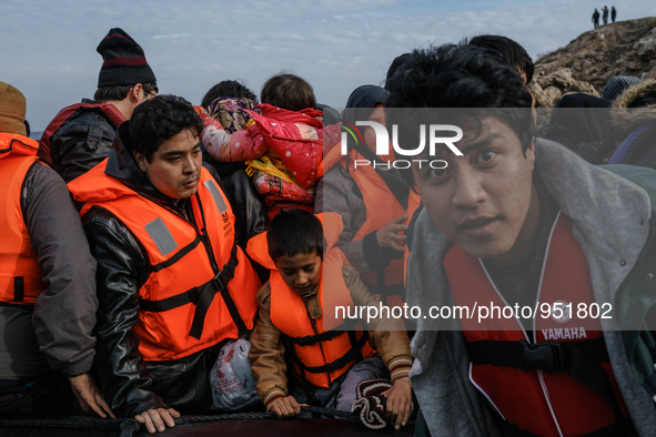 Migrants approach the coast of the Mytilene Greece island of Lesbos on Dec. 9, 2015. 