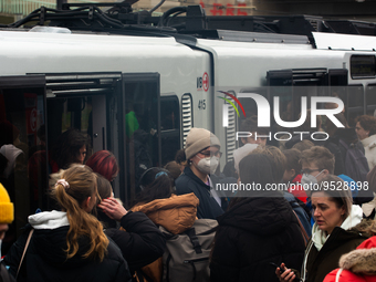 

A general view of people getting off a street Bahn in Cologne, Germany on February 1, 2023, as the state government starts removing the ma...