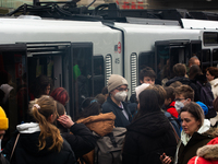 

A general view of people getting off a street Bahn in Cologne, Germany on February 1, 2023, as the state government starts removing the ma...