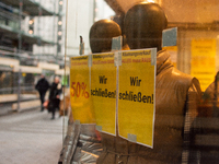 

A closing store sign is seen hanging on a retailer in the city center of Cologne, Germany on February 1, 2023, as the state government sta...