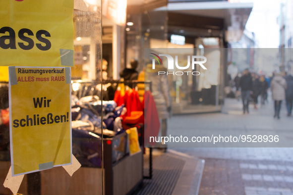 

A closing store sign is seen hanging on a retailer in the city center of Cologne, Germany on February 1, 2023, as the state government sta...