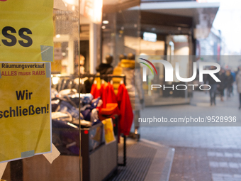 

A closing store sign is seen hanging on a retailer in the city center of Cologne, Germany on February 1, 2023, as the state government sta...