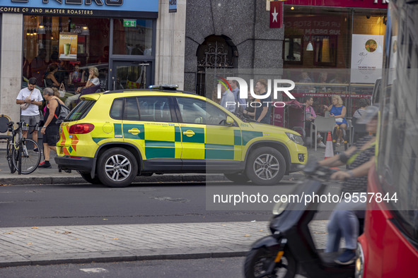 Yellow ambulance, an emergency service vehicle with paramedics of the National Health Service NHS parked on the streets of the British capit...