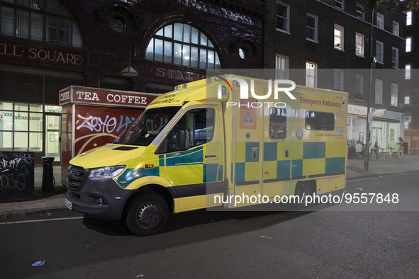 Yellow ambulance, an emergency service vehicle with paramedics of the National Health Service NHS parked on the streets of the British capit...