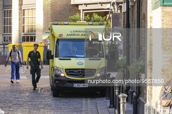 Yellow ambulance, an emergency service vehicle with paramedics of the National Health Service NHS parked on the streets of the British capit...