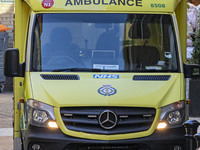 Yellow ambulance, an emergency service vehicle with paramedics of the National Health Service NHS parked on the streets of the British capit...