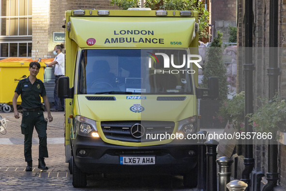 Yellow ambulance, an emergency service vehicle with paramedics of the National Health Service NHS parked on the streets of the British capit...