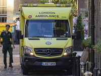 Yellow ambulance, an emergency service vehicle with paramedics of the National Health Service NHS parked on the streets of the British capit...