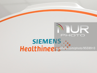 Siemens Healthineers logo is seen on Somatom Confidence scanner in the University Hospital in Krakow, Poland on February 3, 2023. (