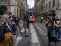 People are seen walking along one of the streets in the Baixa district. Lisbon, January 23, 2023. In Portugal, the transmissibility index (R...