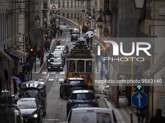 A tram is seen traveling through one of the streets of the Baixa district. Lisbon, January 23, 2023. In Portugal, the transmissibility index...