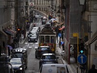 A tram is seen traveling through one of the streets of the Baixa district. Lisbon, January 23, 2023. In Portugal, the transmissibility index...