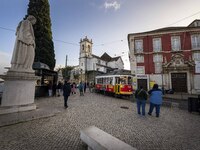 A tram is seen traveling through one of the streets of the Graca district. Lisbon, January 23, 2023. In Portugal, the transmissibility index...