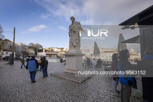 People are seen walking along one of the viewpoints located in the historic district of Graca. Lisbon, January 23, 2023. In Portugal, the tr...