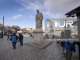 People are seen walking along one of the viewpoints located in the historic district of Graca. Lisbon, January 23, 2023. In Portugal, the tr...