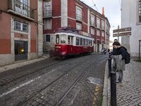 A tram is seen traveling through one of the streets of the Graca district. Lisbon, January 23, 2023.  In Portugal, the transmissibility inde...