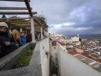 People are seen visiting the Santa Catarina viewpoint, located in the Santa Apolonia neighborhood. Lisbon, January 16, 2023. In Portugal, th...