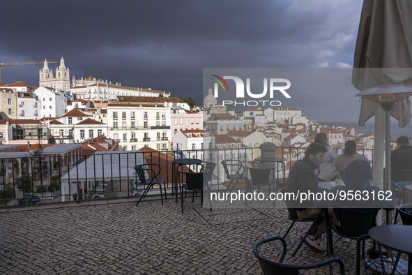 Several people are seen touring a viewpoint located in the Santa Apolonia neighborhood. Lisbon, January 16, 2023. In Portugal, the transmiss...