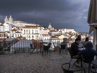 Several people are seen touring a viewpoint located in the Santa Apolonia neighborhood. Lisbon, January 16, 2023. In Portugal, the transmiss...