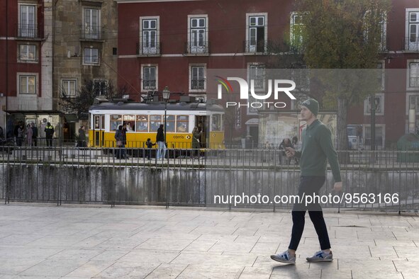 A man is seen walking along one of the viewpoints located in the historic district of Graca. Lisbon, January 23, 2023. In Portugal, the tran...