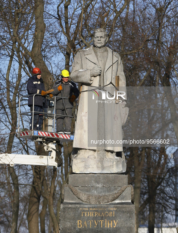 Ukrainian municipal workers dismount a monument to WWII Soviet Army General Nikolai Vatutin in downtown in Kyiv, Ukraine 9 February 2023, am...