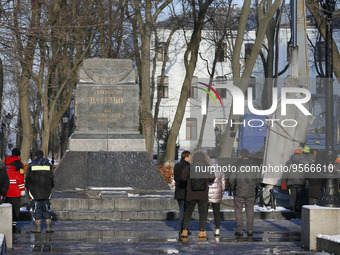 Ukrainian municipal workers dismount a monument to WWII Soviet Army General Nikolai Vatutin in downtown in Kyiv, Ukraine 9 February 2023, am...