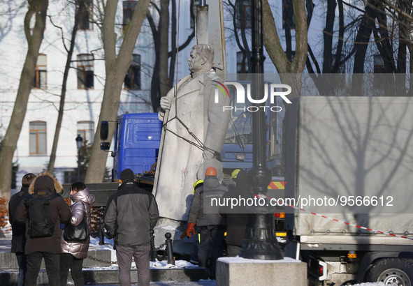 Ukrainian municipal workers dismount a monument to WWII Soviet Army General Nikolai Vatutin in downtown in Kyiv, Ukraine 9 February 2023, am...