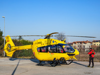 Medical helicopter landed in a public car parking, in Cernusco sul Naviglio, Italy, on February 10, 2023.  (