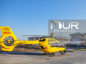 Medical helicopter landed in a public car parking, in Cernusco sul Naviglio, Italy, on February 10, 2023.  (