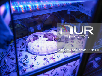 One of the quintuplets, which were born in the University Hospital, is seen in an incubator. Krakow, Poland on February 14, 2023. Three girl...