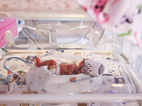 One of the quintuplets, which were born in the University Hospital, is seen in an incubator. Krakow, Poland on February 14, 2023. Three girl...