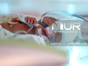 One of the quintuplets, which were born in the University Hospital, is seen in an incubator. Krakow, Poland on February 14, 2023. Three girl...