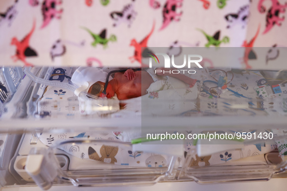 One of the quintuplets, which were born in the University Hospital, is seen in an incubator. Krakow, Poland on February 14, 2023. Three girl...