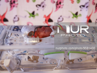 One of the quintuplets, which were born in the University Hospital, is seen in an incubator. Krakow, Poland on February 14, 2023. Three girl...